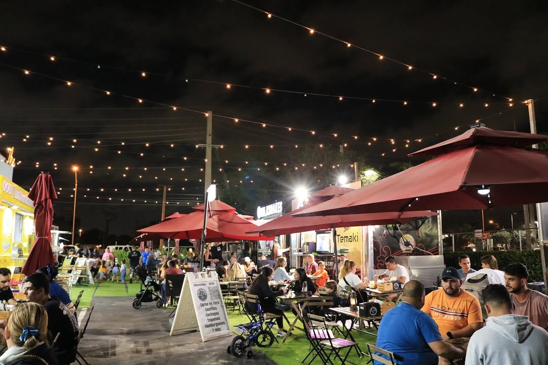 Pickleball players enjoying the outdoor foodcourt at The Yards at Amelia